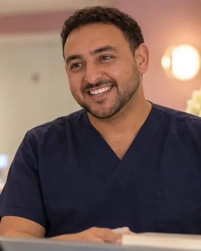 Dentist chatting with a patient at the reception desk
