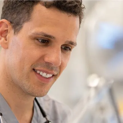 Dr Joao Souteiro smiling, close-up