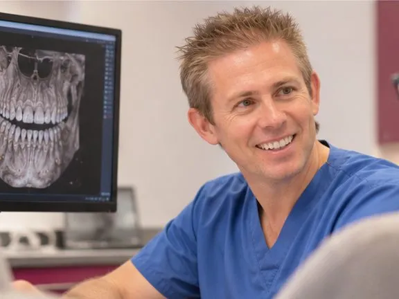 Dr Ross Cutts explaining a 3D scan to a patient
