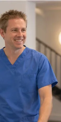 Dr Ross Cutts in the practice corridor